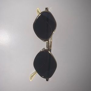 Gold and black sunglasses